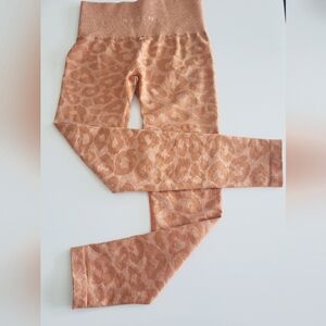 NVGTN Orange Leggings High Waist Performance